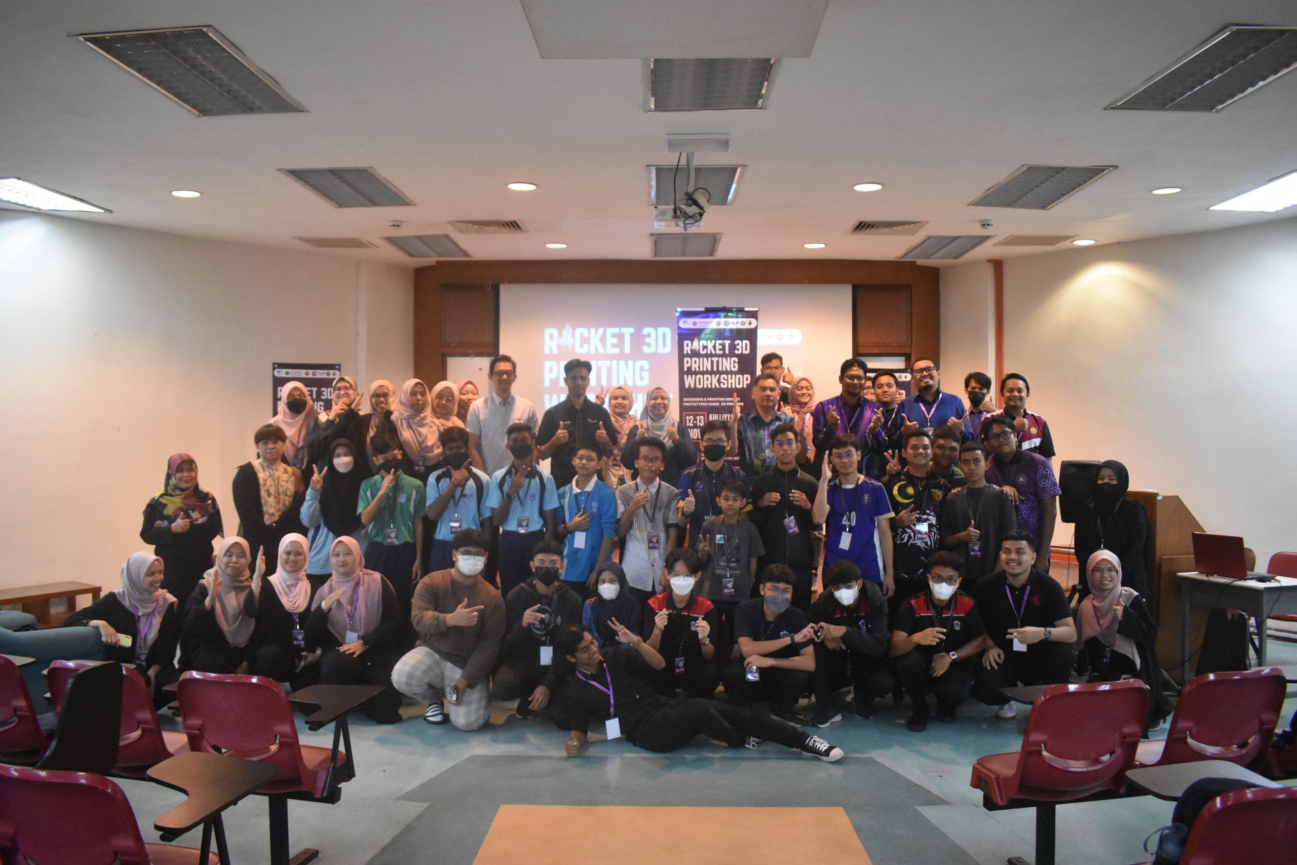 Prof. Dr. Ahmad Faris, along with the participants and committee members, after the launching ceremony